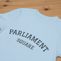 Light blue t-shirt with wood texture background